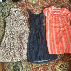 Three summer dresses.  Size small and 4